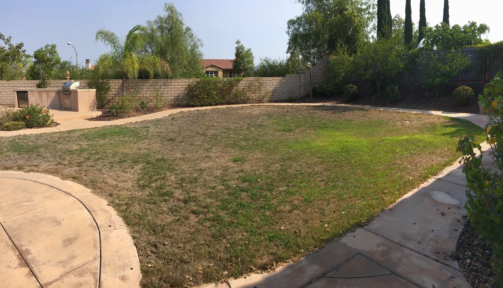 Finished backyard with synthetic turf